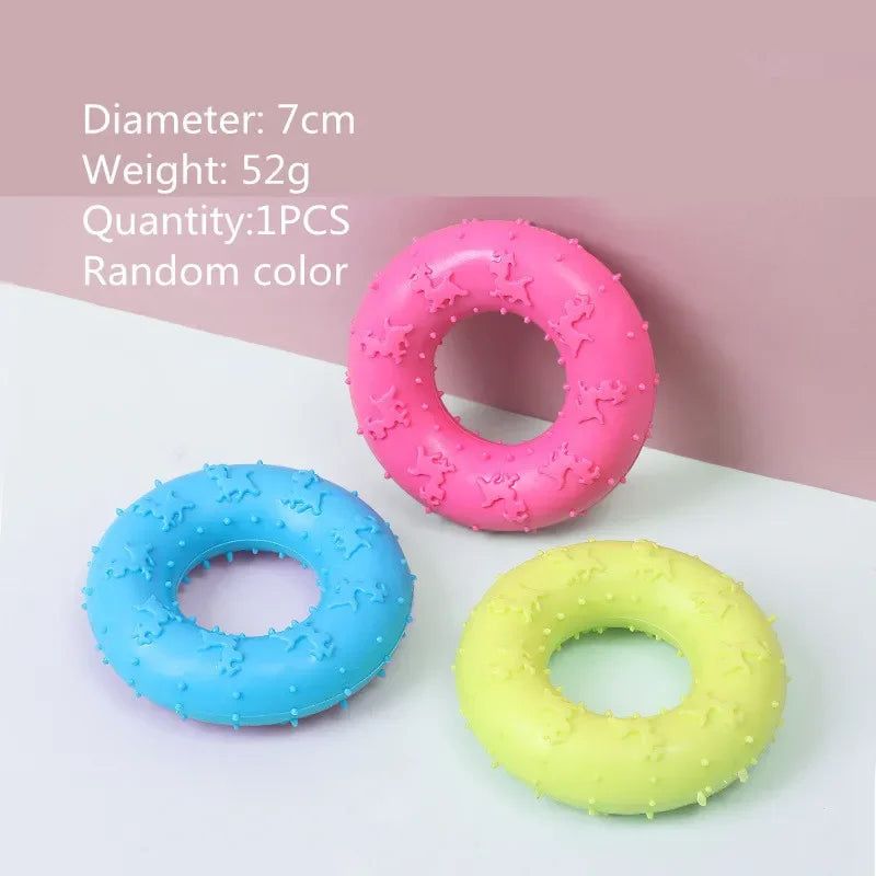 Three colorful rubber donut toys with text indicating diameter, weight, quantity, and color randomness on a light background.