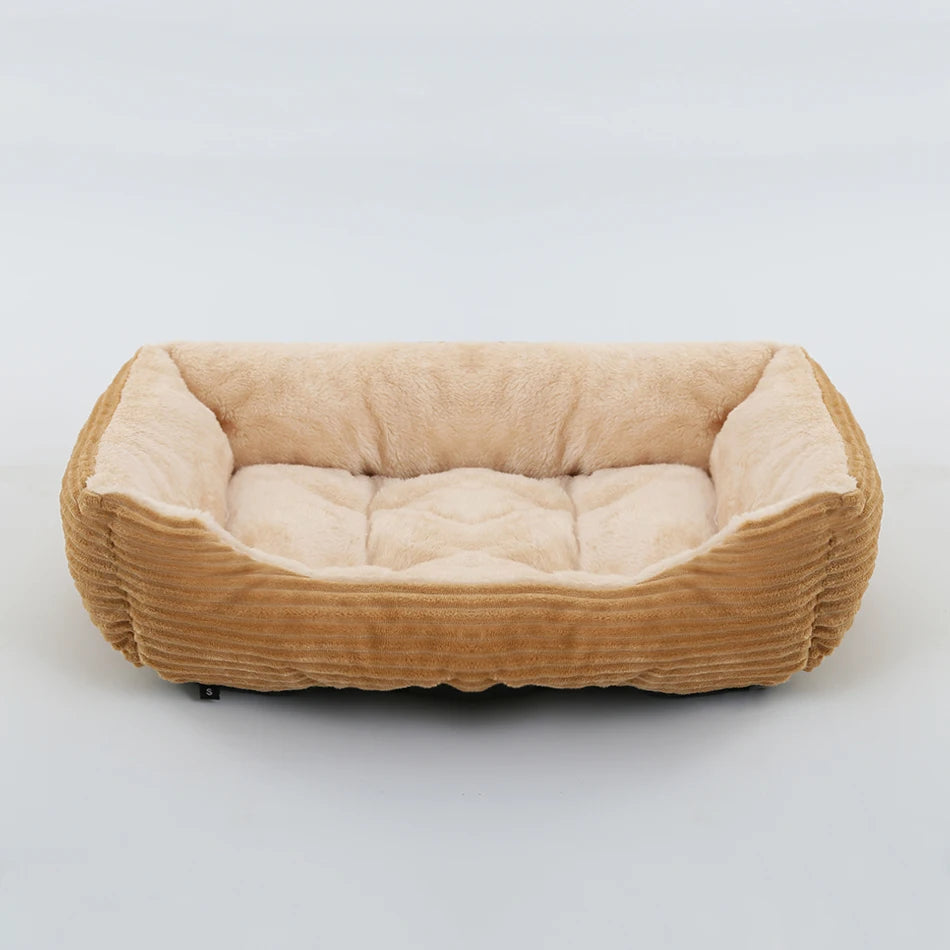 Beige pet bed with a soft texture on a light gray background