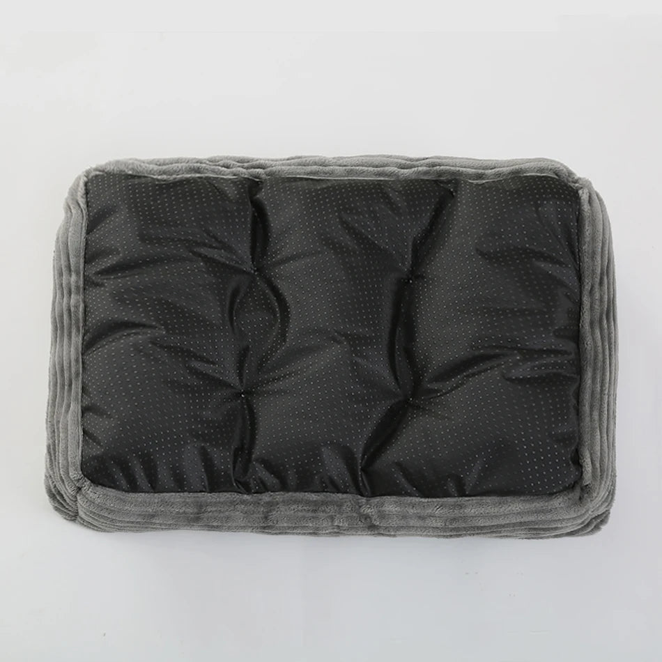 Black cushion with gray border on a white background