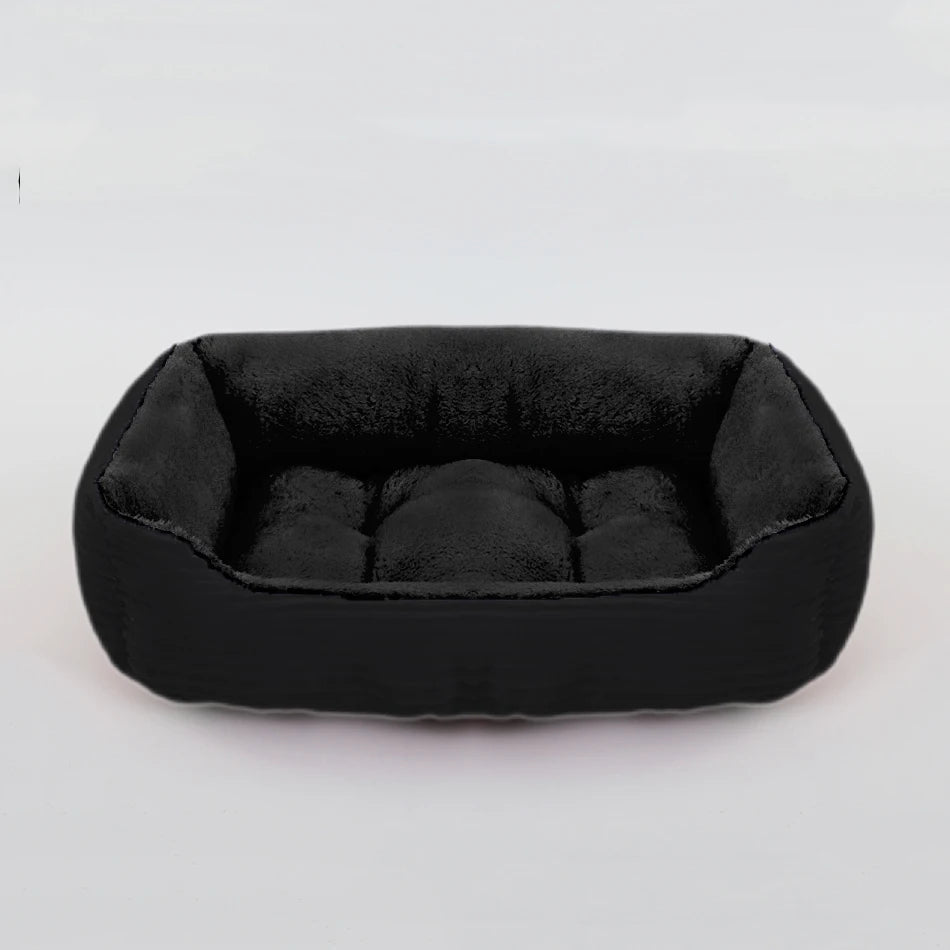 Black pet bed on a white background