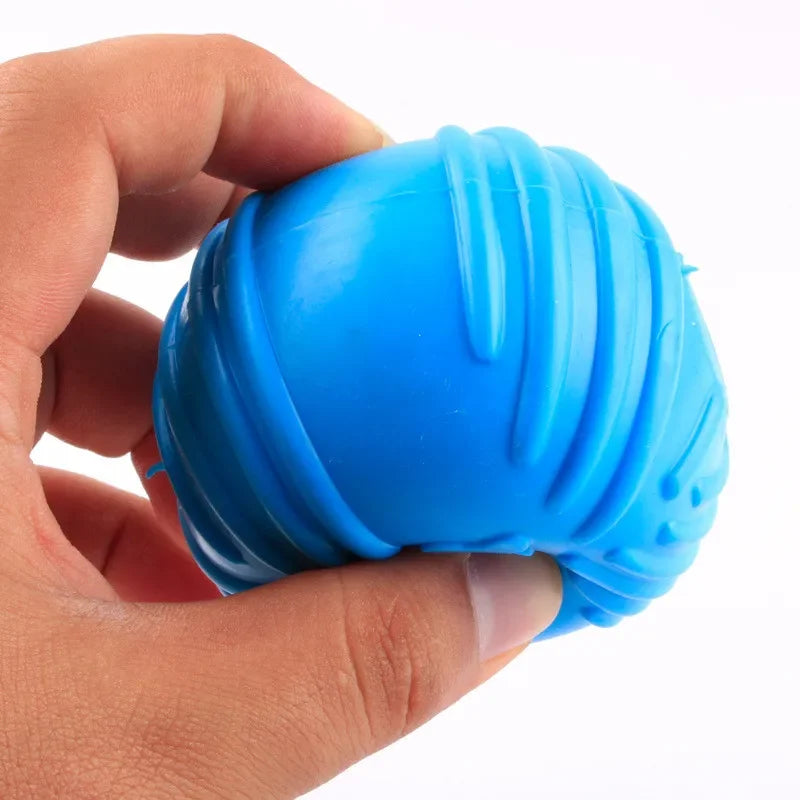 Blue textured ball held in a hand against a white background