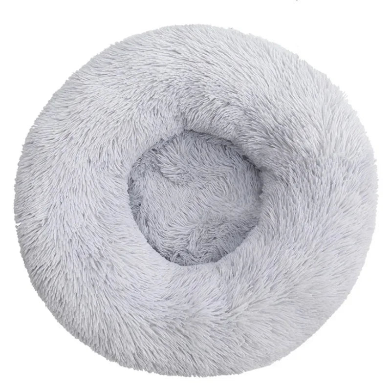 Cozy calming dog bed with long plush fabric