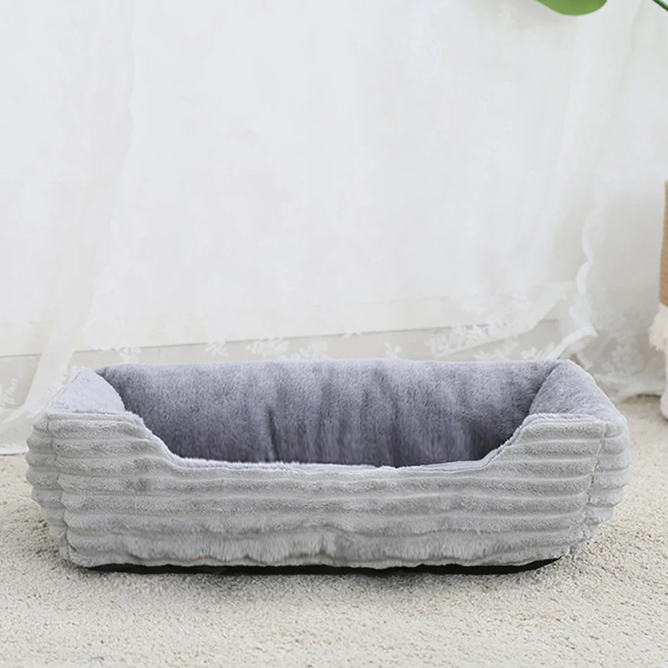 Gray pet bed on a light background