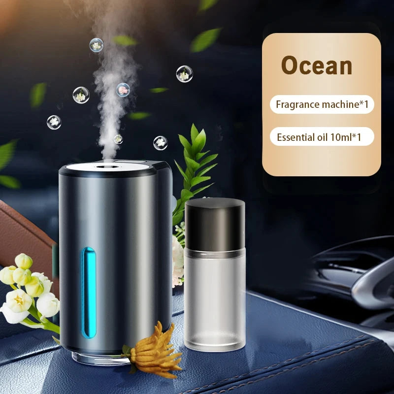 Fragrance machine and essential oil bottle with 'Ocean' fragrance on a dark surface.