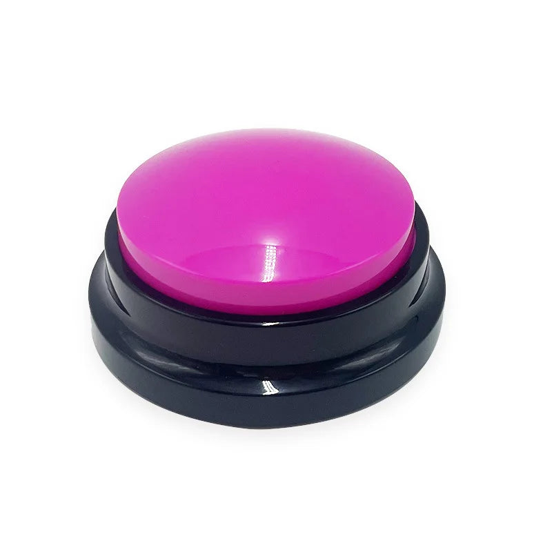 Large pink button with a black base on a white background