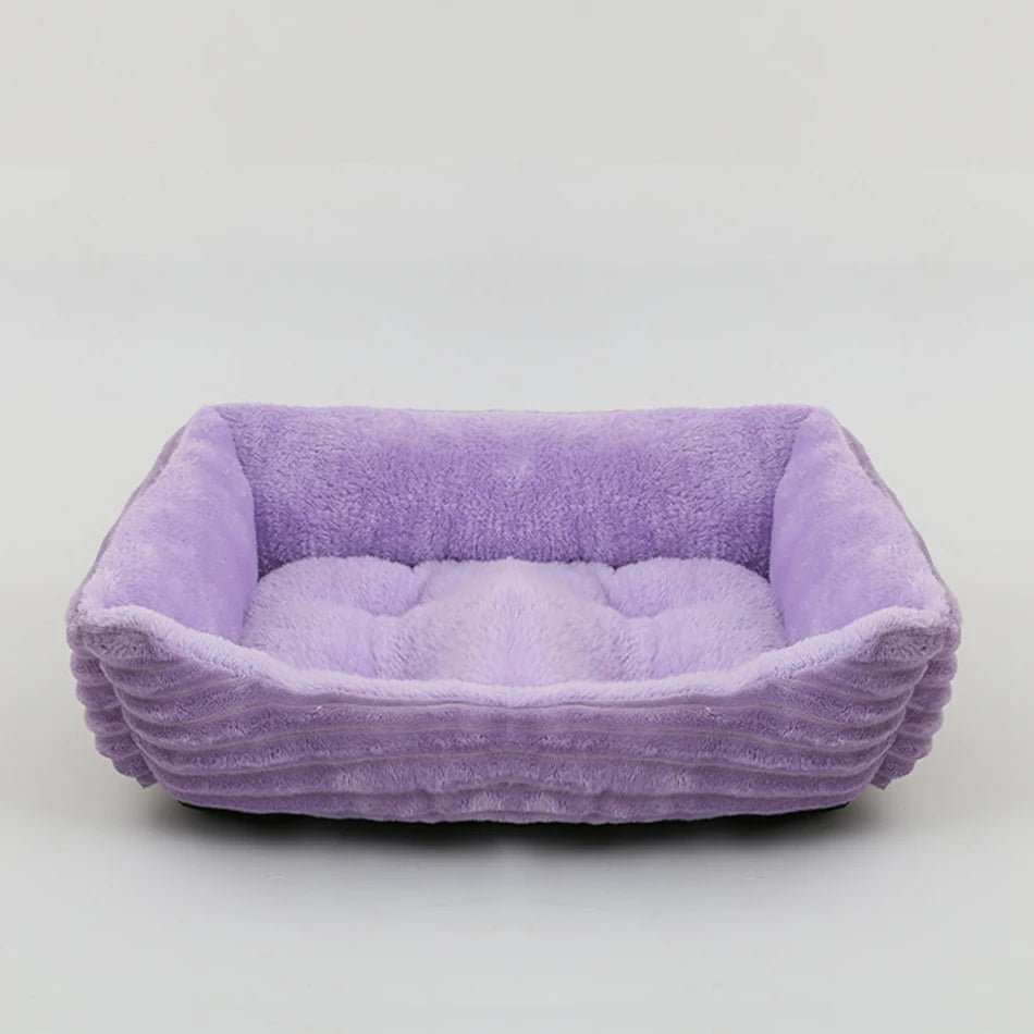 Purple pet bed on a light gray background