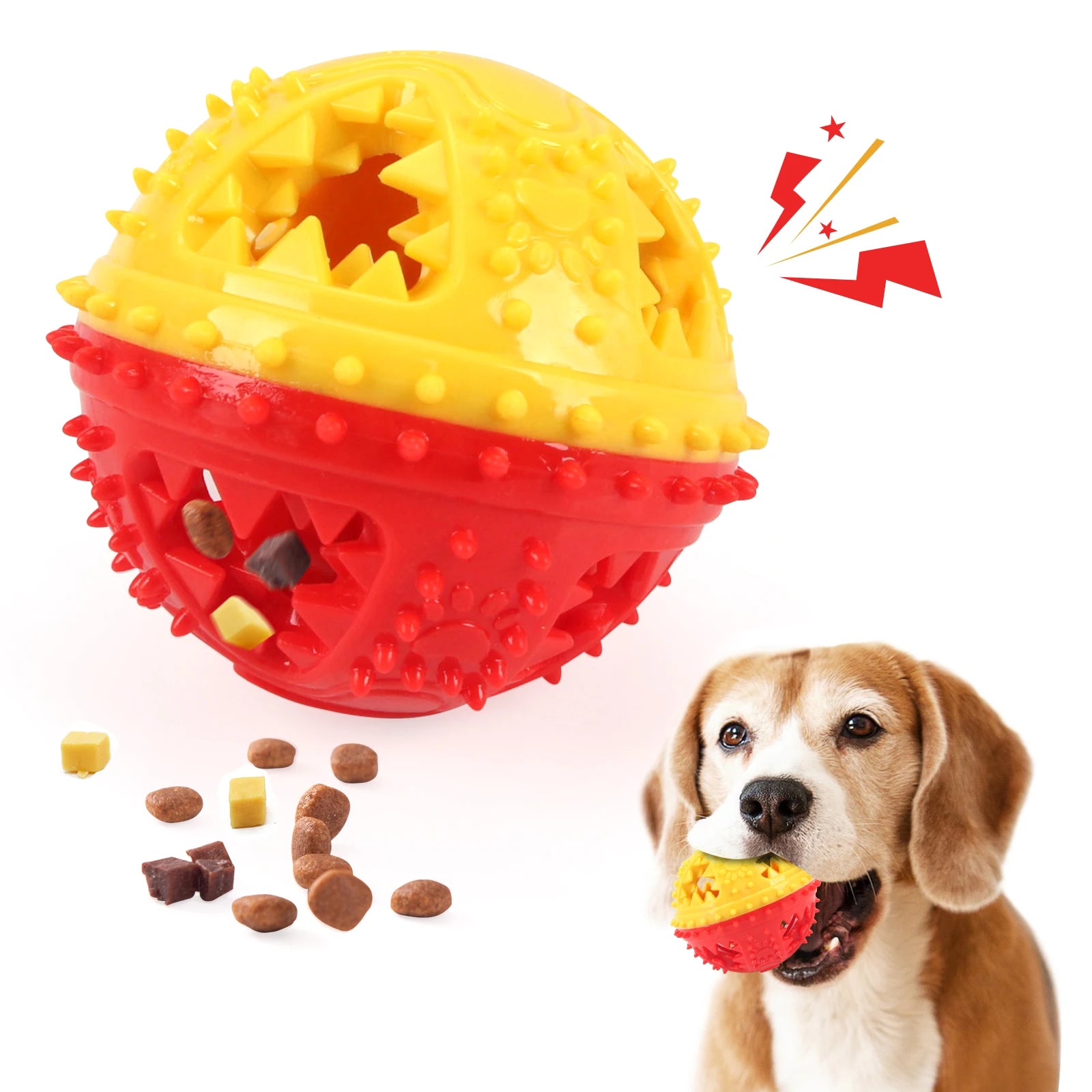 Yellow and red dog toy with spikes and a dog holding it, on a white background.