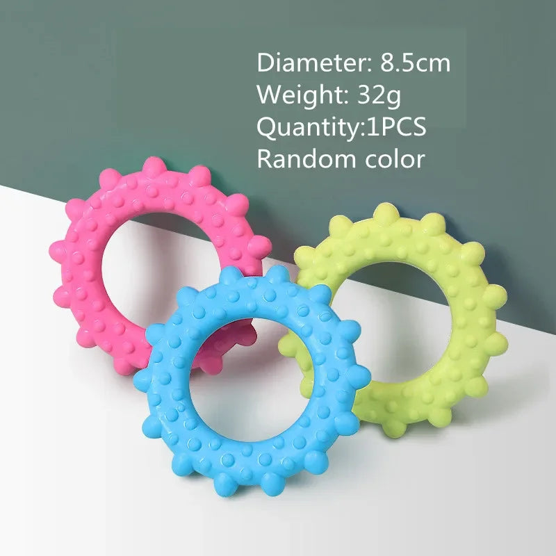 Three colorful silicone teething rings on a white surface with text displaying dimensions and weight.